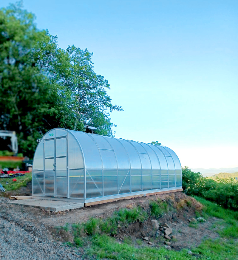 ClimaOrb 9x21 greenhouse on a foundation