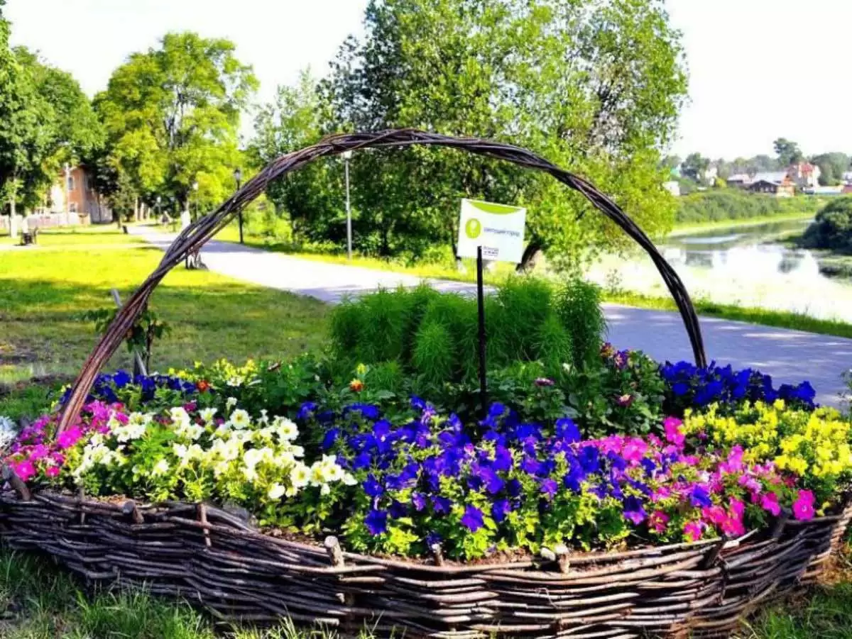 The large basket with flowers like a flower garden