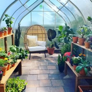 ClimaPod 9x14 Greenhouse Kit interior with flowerpots photo from customer
