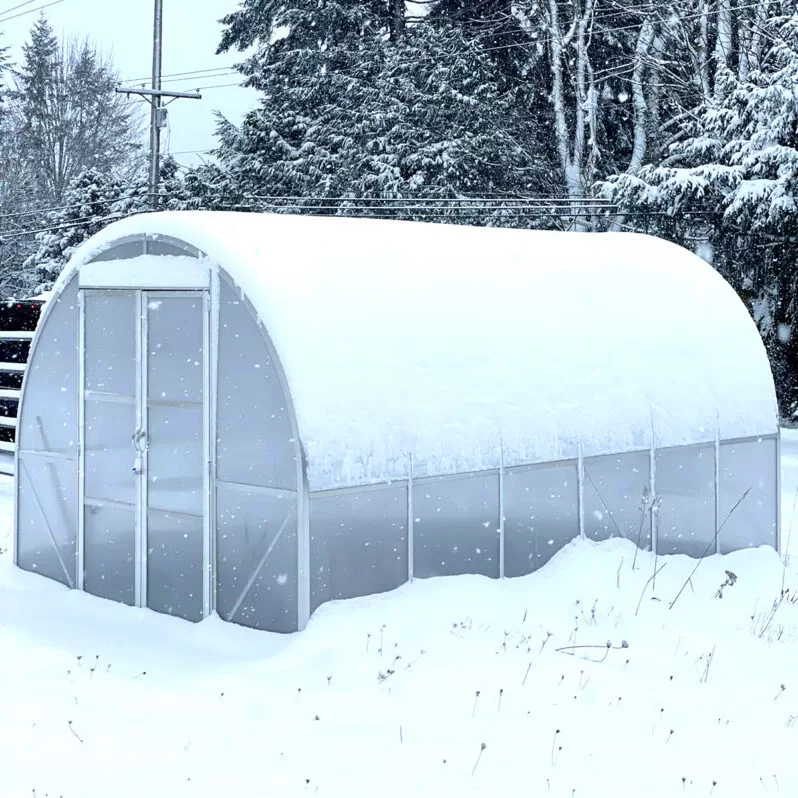 ClimaOrb Arched tunnel winter greenhouse in Snow